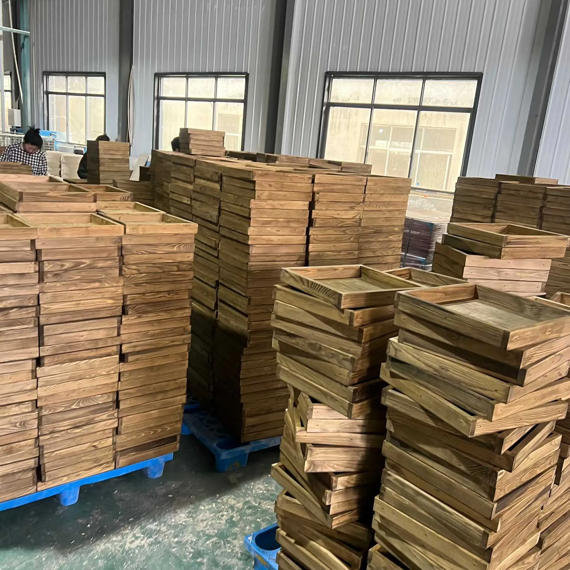 Pre-shipment QC — every box checked against the approved sample, then wrapped, palletised and documented for the destination port.
